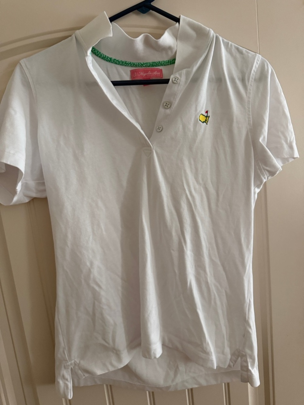 Women's White Short-Sleeve Button-Down Polo with Yellow Embroidered Accent
